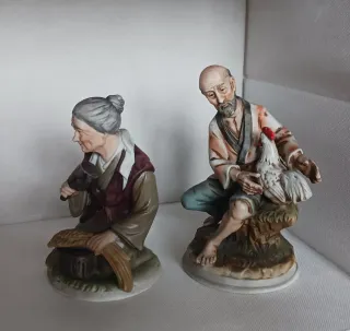 Pareja figuras campesinos porcelana japonesa.