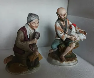 Pareja figuras campesinos porcelana japonesa.