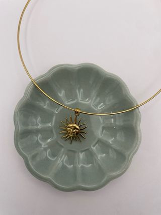 Collana girocollo con ciondolo sole mediterraneo