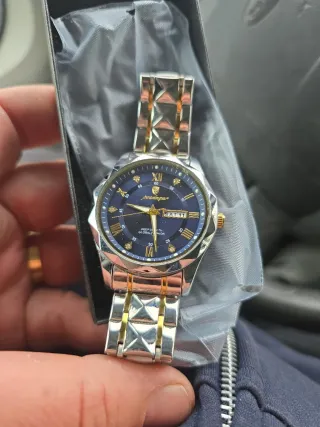 Orologio POEDAGAR di lusso in oro e argento