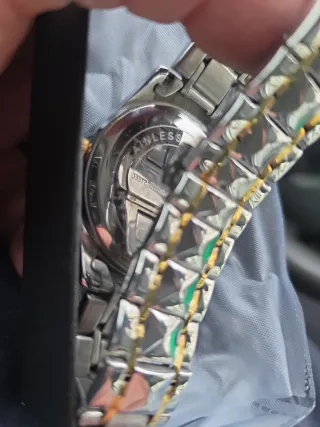 Orologio POEDAGAR di lusso in oro e argento