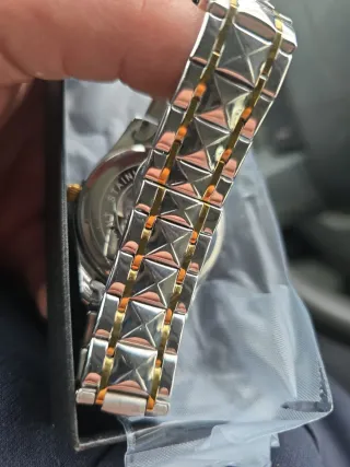 Orologio POEDAGAR di lusso in oro e argento