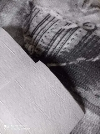 Lotti di stoffa fantasia e tinta unita grigio