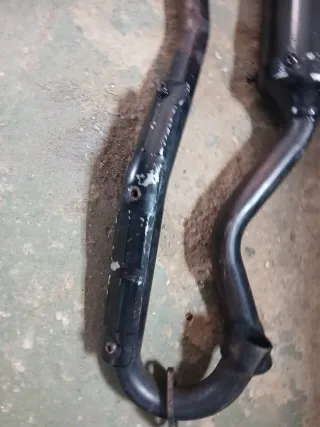 Sistema de escape para moto