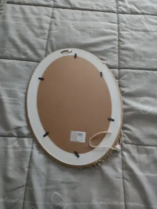Specchio ovale decorato con conchiglie