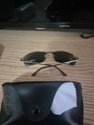 Gafas de sol Ray-Ban negras filo dorado