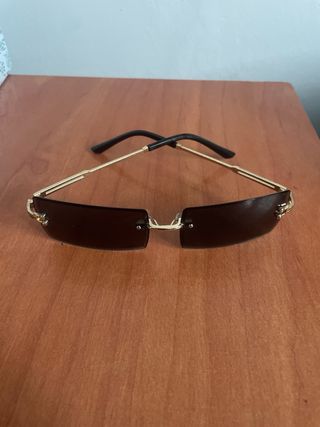Gafas de sol vintage sin marco doradas