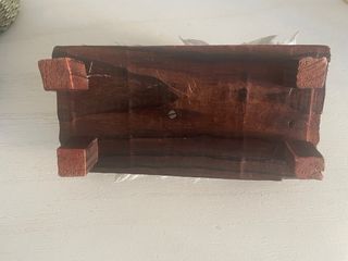 Niño Jesús en cuna de madera