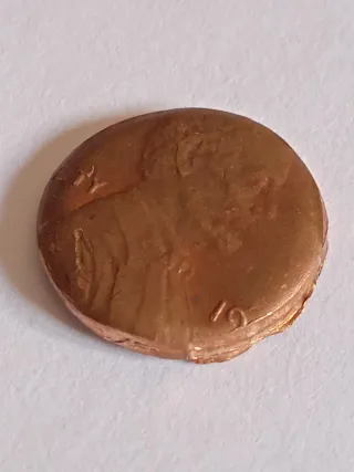 MONEDA 1 CENTAVO LINCOLN.19??.ERROR MAL RECORTADA.