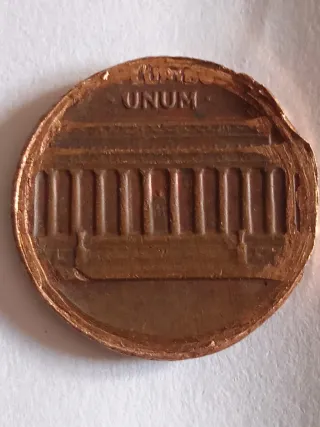 MONEDA 1 CENTAVO LINCOLN.19??.ERROR MAL RECORTADA.