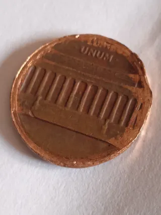 MONEDA 1 CENTAVO LINCOLN.19??.ERROR MAL RECORTADA.