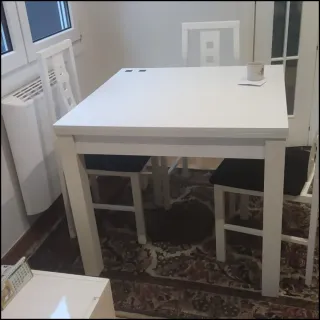 Mesa de comedor blanca extensible y 4 sillas