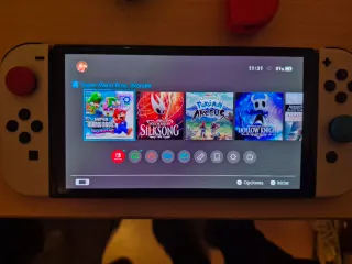 Nintendo Switch OLED + 2 Giochi e Accessori