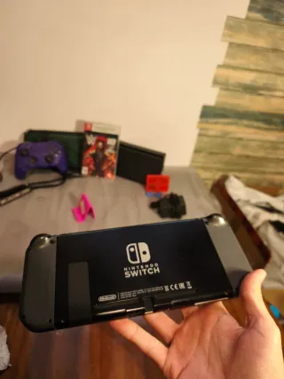 Nintendo Switch Grigio + Accessori e Gioco