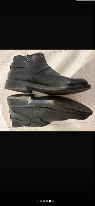 Botas de hombrede cuero negro con cremallera