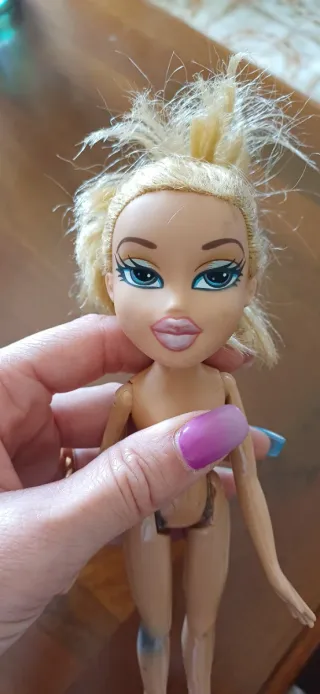 Lotto 4 bambole Barbie