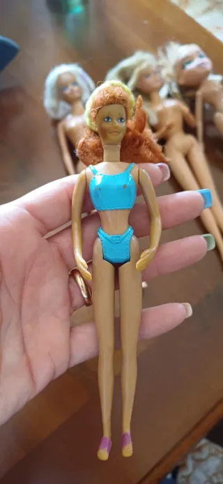 Lotto 4 bambole Barbie