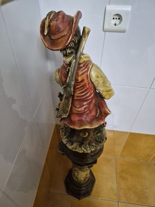 Figura porcelana niño con perro