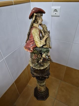 Figura porcelana niño con perro