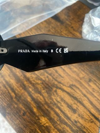 Gafas de sol Prada negras como nuevas