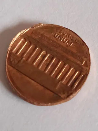 MONEDA 1 CENTAVO LINCOLN.19??.ERROR MAL RECORTADA.