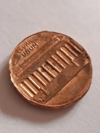 MONEDA 1 CENTAVO LINCOLN.19??.ERROR MAL RECORTADA.