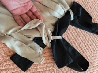 Top sin mangas T.M negro y beige