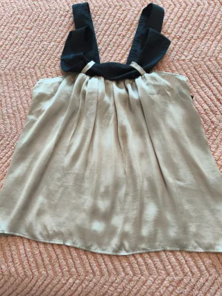 Top sin mangas T.M negro y beige