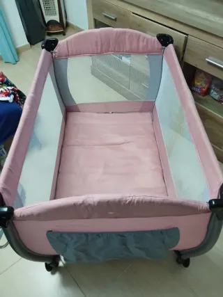 Cuna de viaje rosa