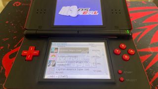 NINTENDO DS LITE ROJA + CARGADOR Y JUEGOS