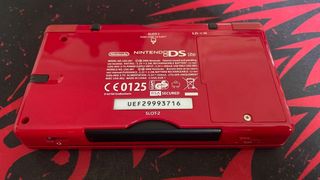 NINTENDO DS LITE ROJA + CARGADOR Y JUEGOS