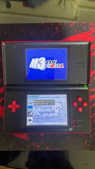 NINTENDO DS LITE ROJA + CARGADOR Y JUEGOS