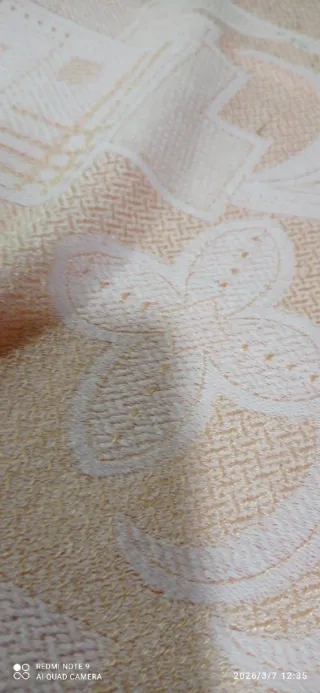 Colcha rosa pastel antigua