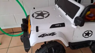 Bicicleta infantil naranja + coche eléctrico