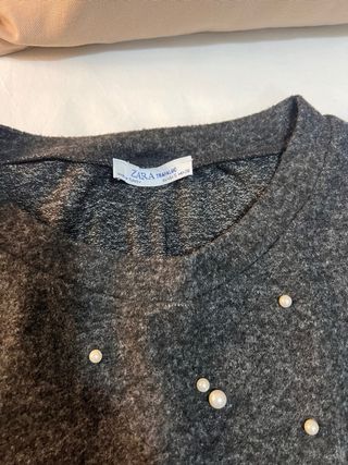 Jersey manga corta detalle perlas