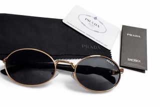 Gafas de Sol Prada Mujer Hombre Dorado Negro