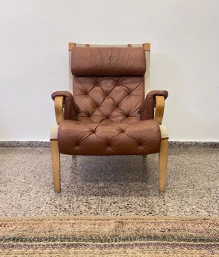 Alquiler sofas y butaca Nielaus piel Danés
