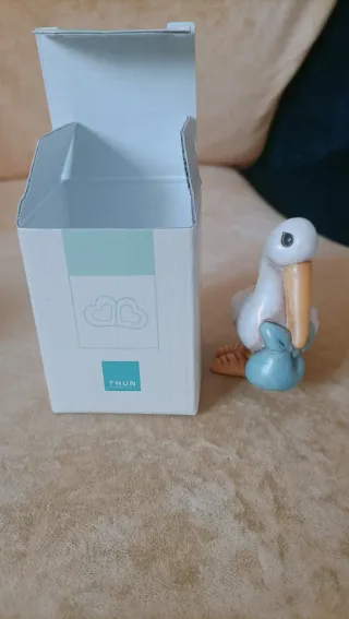 Statuina Thun cicogna con fagotto