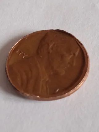 MONEDA 1 CENTAVO LINCOLN.19??.ERROR MAL RECORTADA.