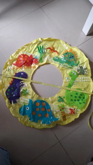 Flotador infantil dinosaurios amarillo