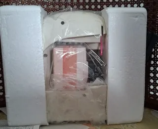 Máquina de coser Genius con doble hebra