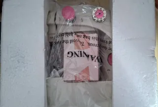 Máquina de coser Genius con doble hebra