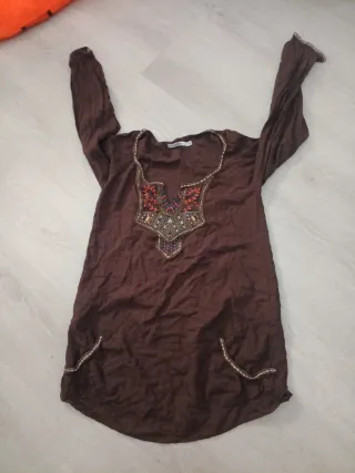 Vestiti 2€ scorrimento foto varie domande offerta