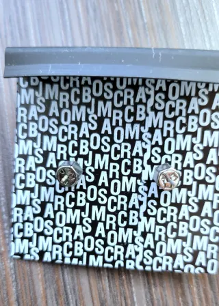 Pendientes Marc by Marc Jacobs dorados y plateados