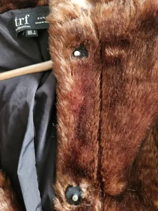 Chaqueta de piel con capucha