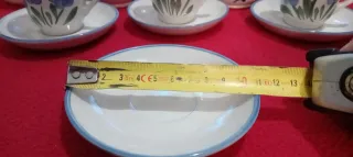 Juego de té de porcelana con flores azules