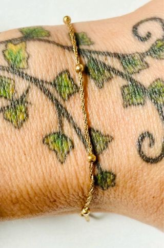 Pulsera con bolitas en oro laminado de 18 quilates