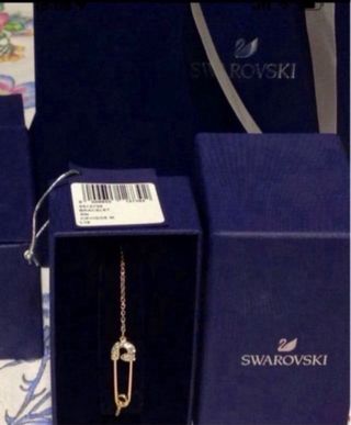 PULSERA SWAROVSKI DORADA. NUEVA