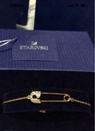 PULSERA SWAROVSKI DORADA. NUEVA