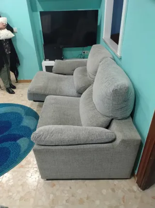 Sofá gris de tela